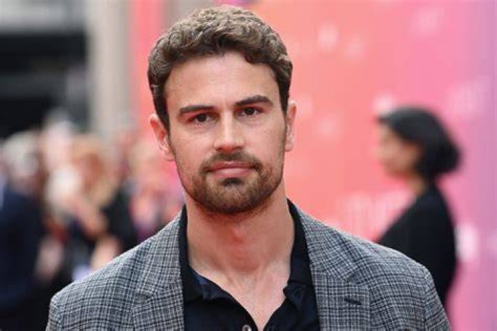 Theo James' Wife Wouldn't Want to Hang Out With His Younger Self